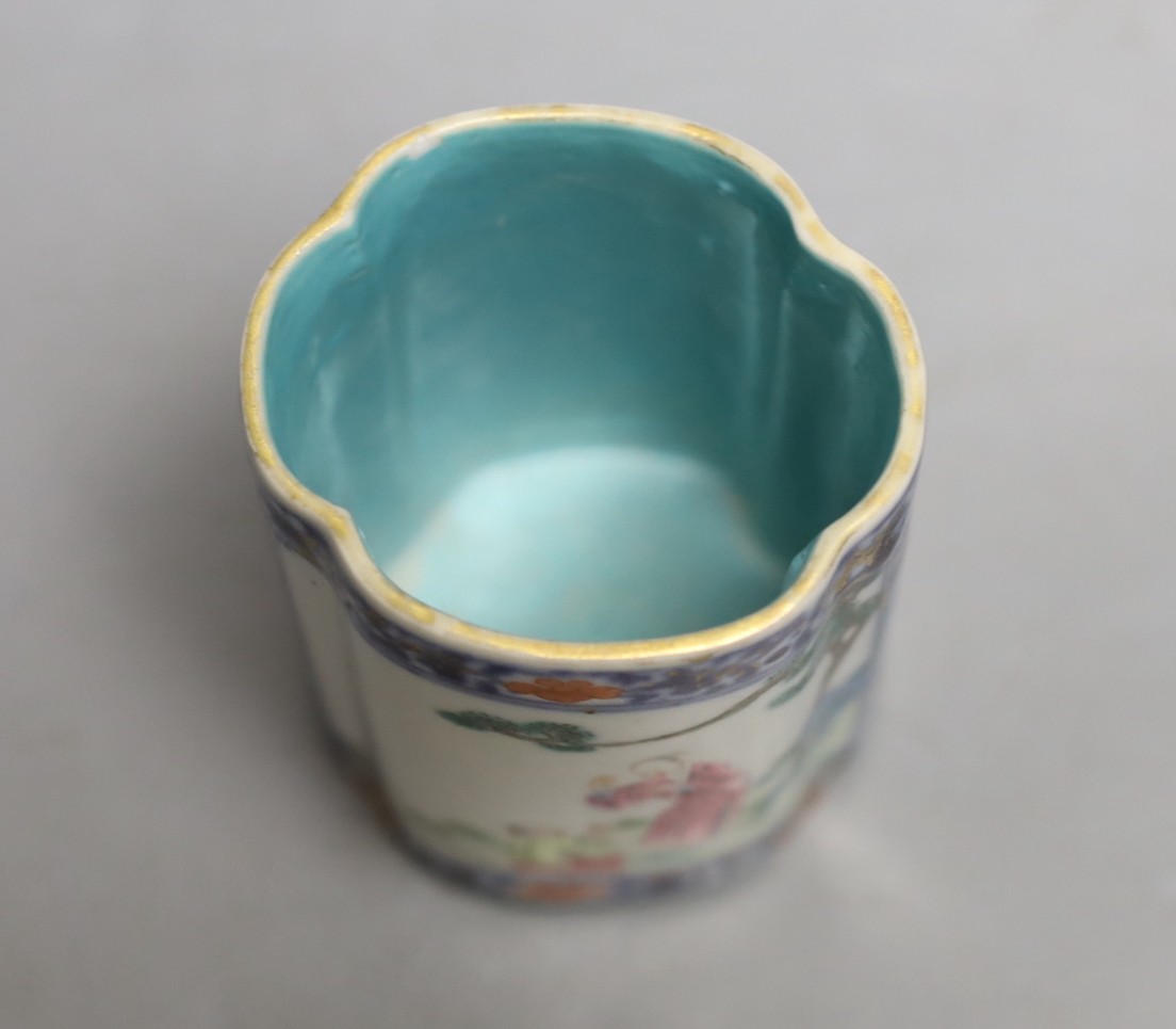 A Chinese famille rose fencai brush pot, Qianlong seal mark but 19th century, 8.1 cm high, wear to gilding